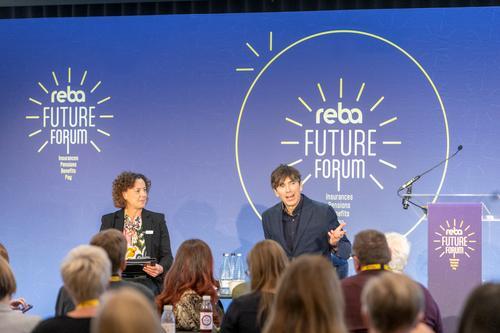 Simon Reeve, renowned adventurer and TV presenter on stage with REBA's Debi O'Donovan