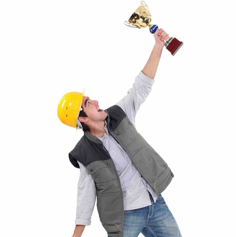 Man holding trophy